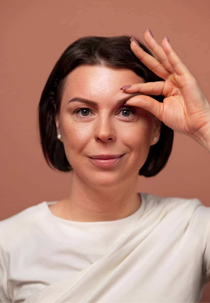 Who is a good candidate for blepharoplasty?